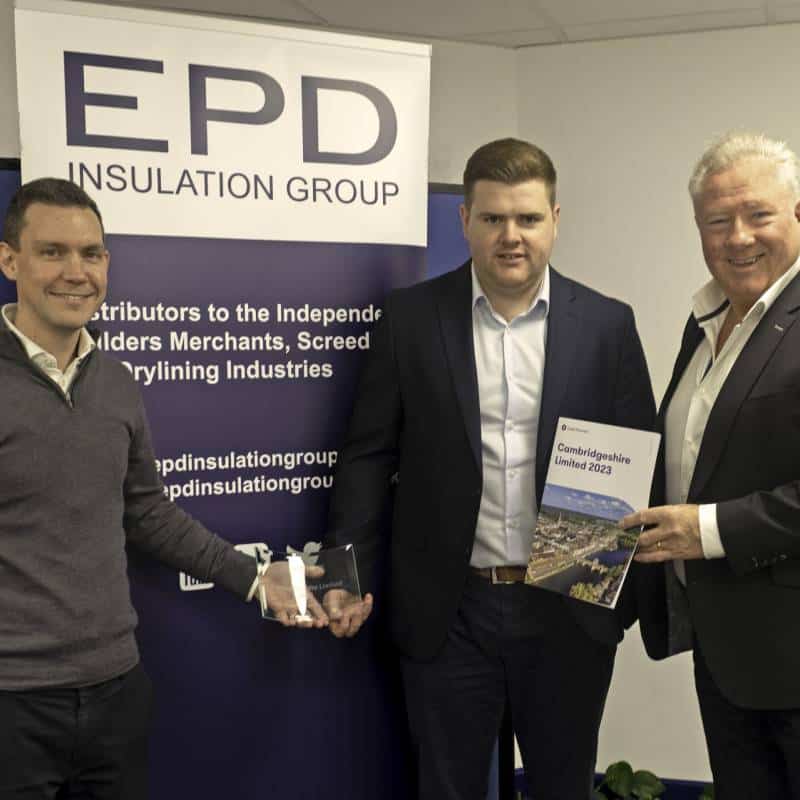 Three men at EPD Insulation Group event with award.