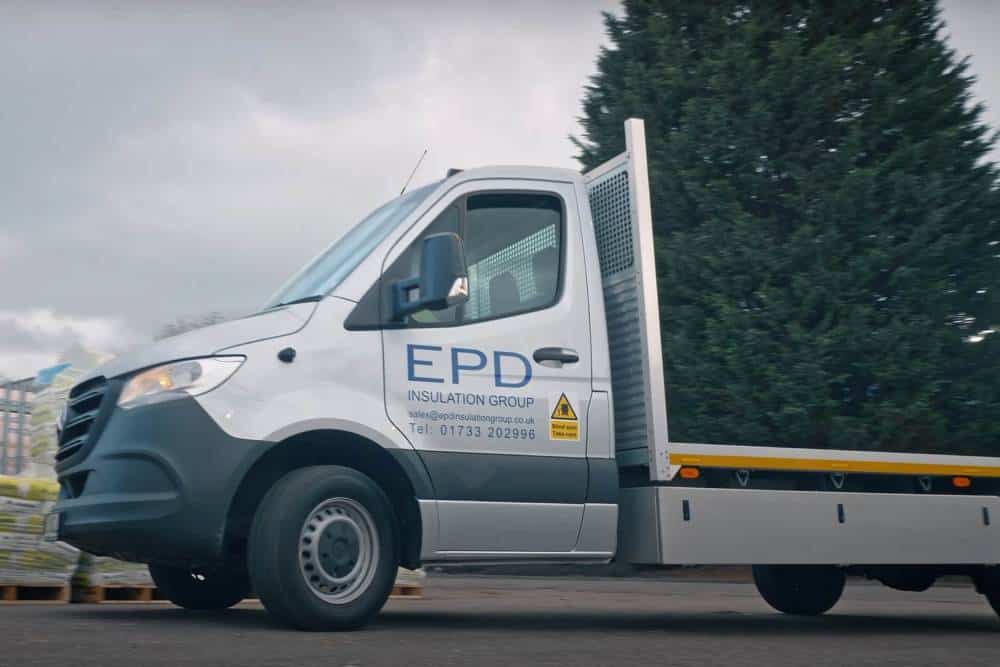 EPD Insulation Group van driving past a tree