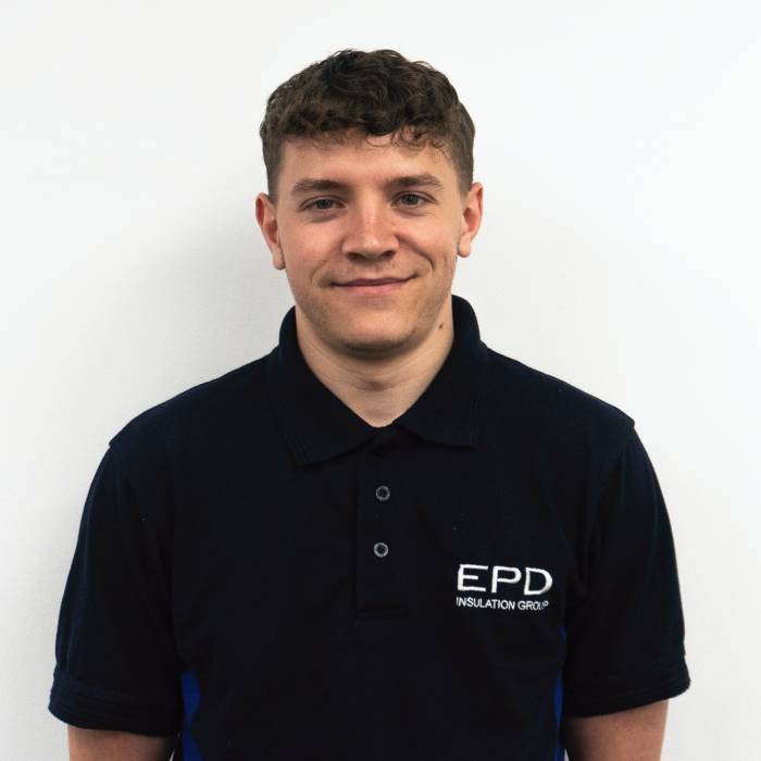 Smiling young man in EPD Insulation Group uniform.