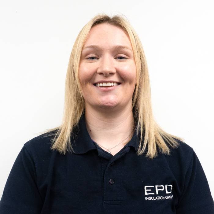 Smiling woman in EPO Insulation Group uniform.