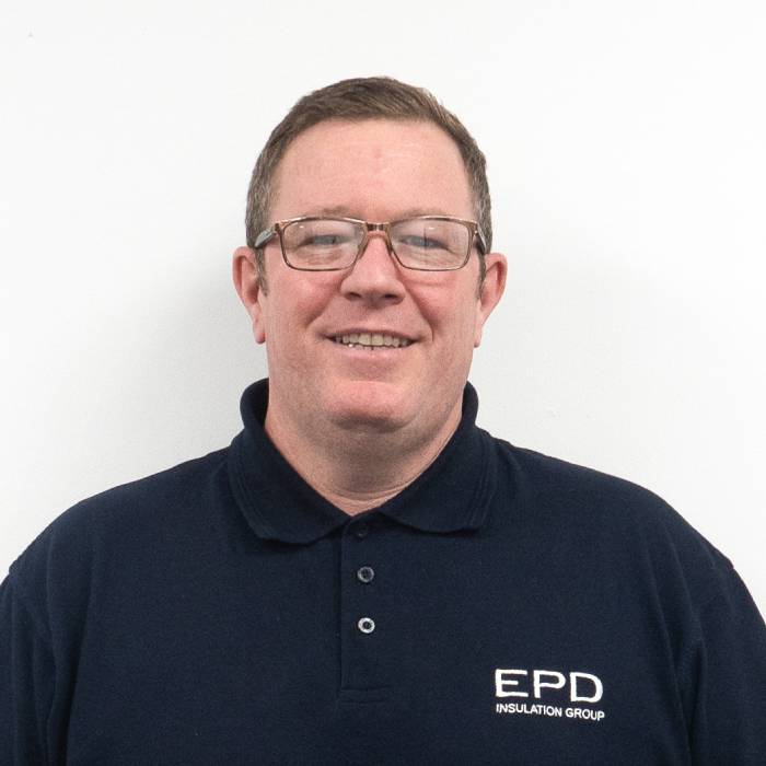 Man in EPD Insulation Group uniform smiling