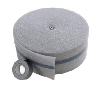 Grey foam insulation tape rolls on white background