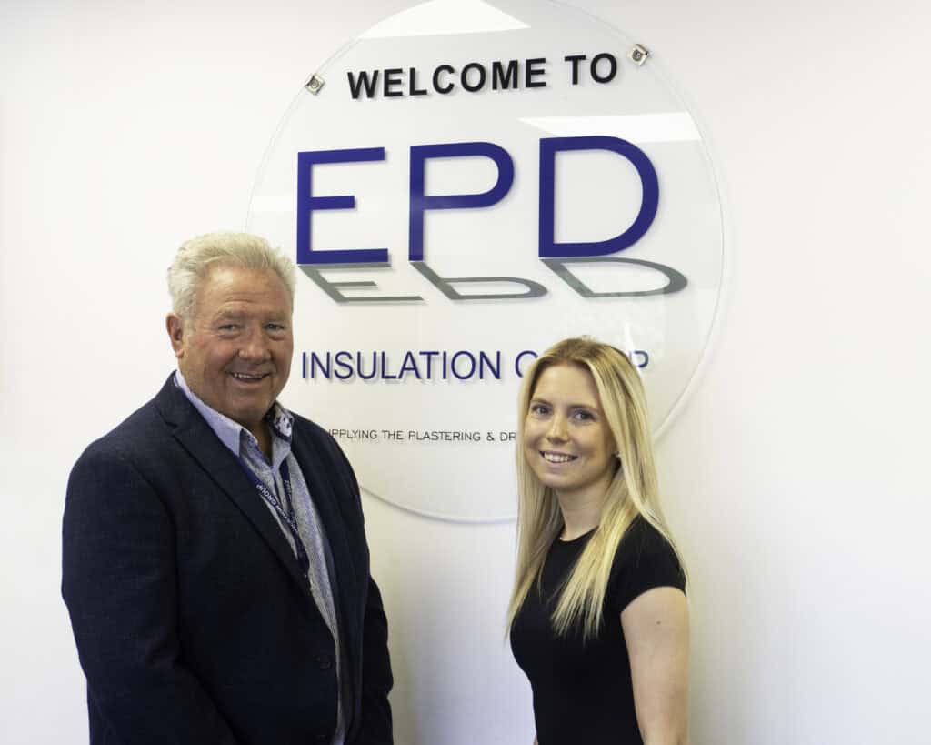 Two professionals posing by EPD Insulation Group logo