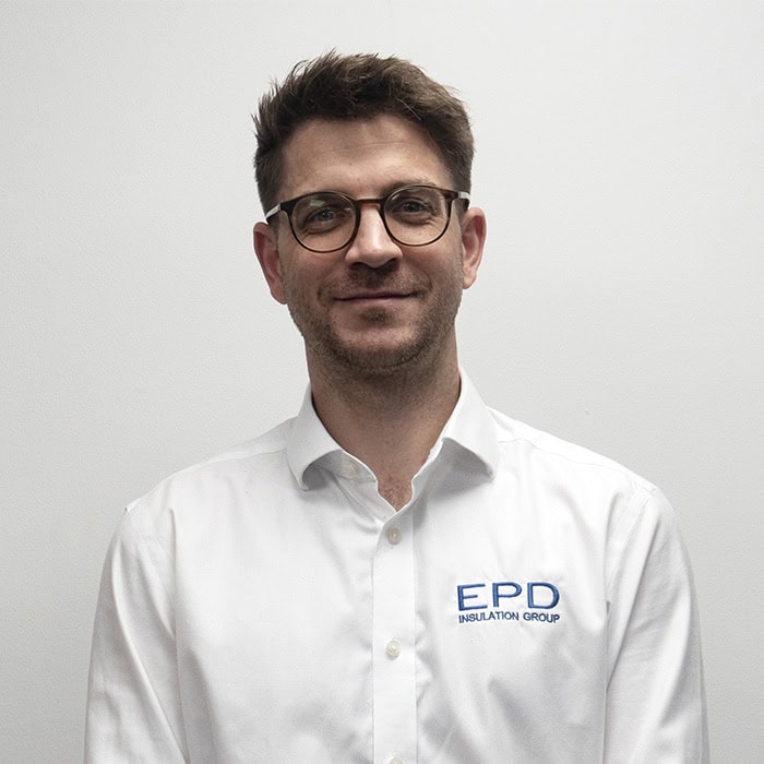 Smiling man in glasses wearing EPD Insulation Group shirt